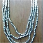 four strand necklaces beads with steels charm